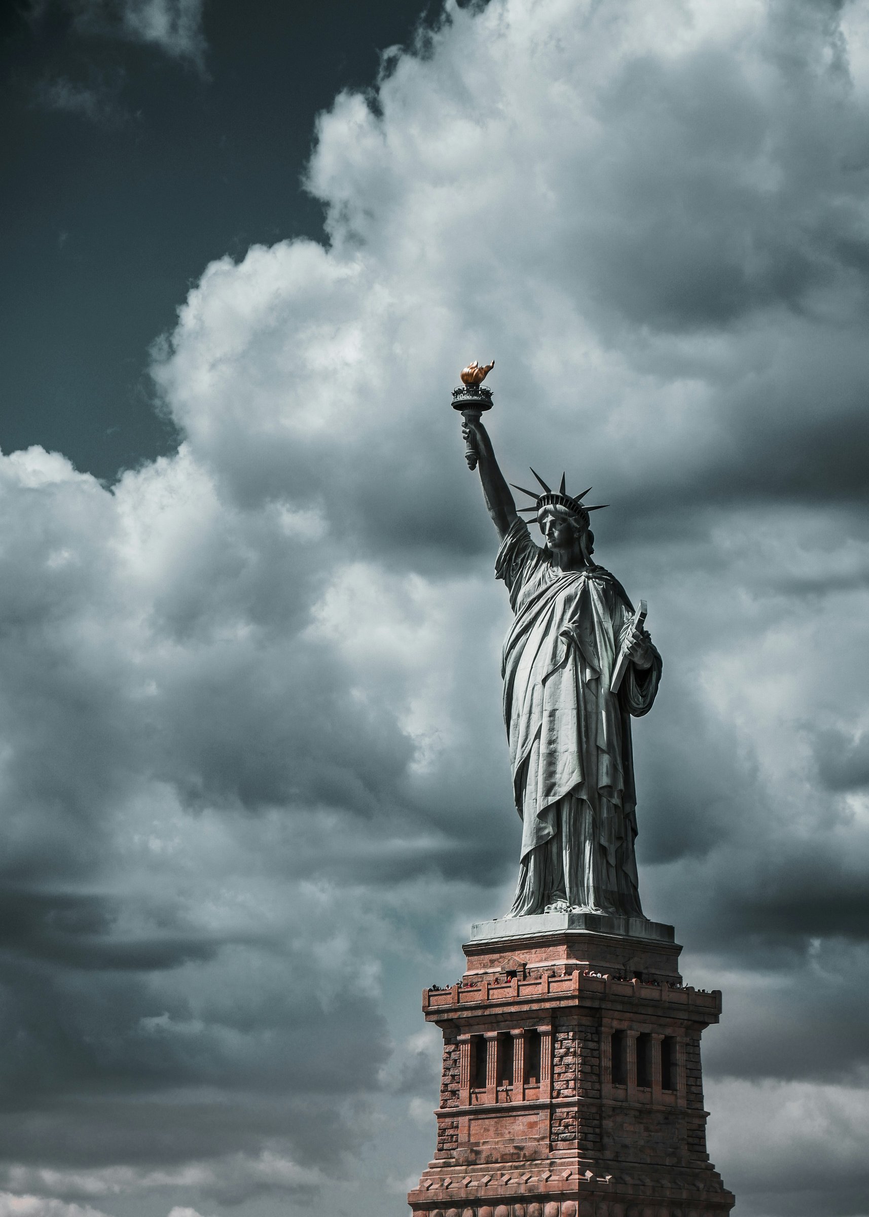 The Statue of Liberty standing on Liberty Island in New York Harbor