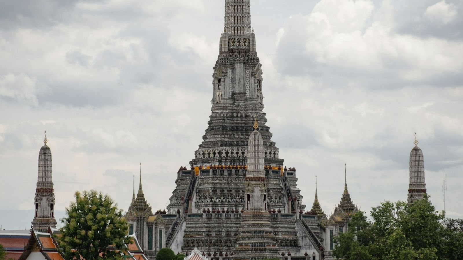 Wat Arun temple on the bank of the Chao Phraya river in Bangkok, Thailand